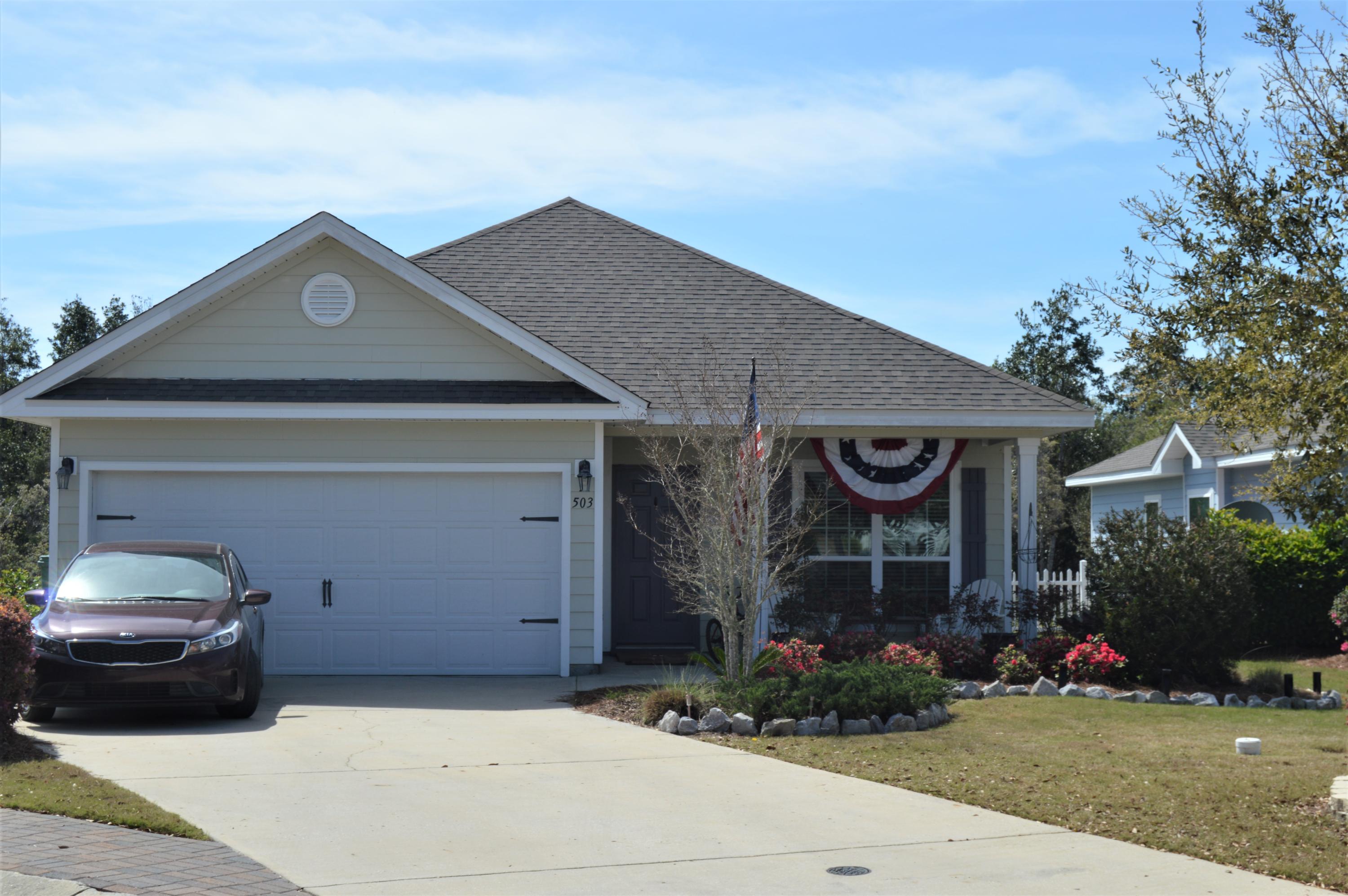 Great location in Hammock Bay's Schooner Landing. 3 bed 2 bath open floor plan with huge kitchen that includes a large island and granite countertops. The floor plan has a wonderful flow with high ceilings and arches separating kitchen from living. The back yard is fenced in with absolutely no neighbors to the back. You will love the back yard from the covered back patio. This corner lot has terrific curb appeal and a two car garage. This home is situated near the best amenities offered by Hammock Bay. You are within walking distance to pools and tennis courts. The HOA dues include cable and lawn maintenance making this home as low maintenance as it comes.
