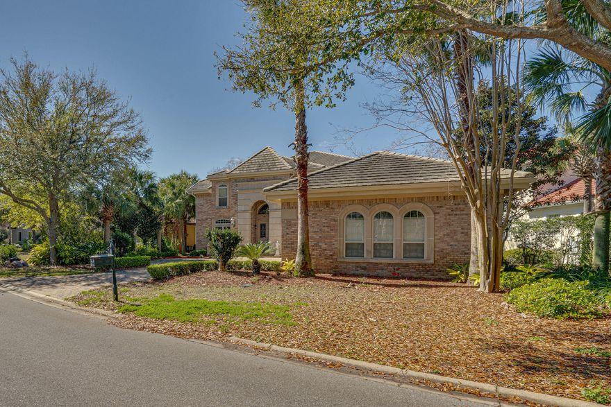 GORGEOUS CUSTOM EUROPEAN DESIGNED HOME LOCATED IN GATED REGATTA BAY OVERLOOKING THE POND, 16TH HOLE AND 17TH TEE BOX! ENJOY BALCONIES ON BOTH LEVELS OVERLOOKING THE SCENIC BACKYARD.  AS YOU ENTER YOU ARE GREETED BY A CURVED STAIRCASE AND TRAVERTINE FLOORING.  DOWNSTAIRS YOU WILL FIND A SPACIOUS MASTER SUITE WITH A LUXE BATH, TWO LIVINGS AREAS, FORMAL DINING, BREAKFAST ROOM, AND A WELL APPOINTED CHEF'S KITCHEN WITH DOUBLE OVENS, LARGE COOK ISLAND AND GORGEOUS CABINETRY.  UPSTAIRS YOU WILL FIND AN OFFICE WITH HALF BATH, TWO ADDITIONAL SPACIOUS BEDROOMS, AND A SECOND MASTER SUITE WITH ANOTHER INCREDIBLE BATH WITH SEPARATE SHOWER, JETTED TUB, AND DUAL VANITIES.  THE MASTER AND ANOTHER BEDROOM HAVE DIRECT ACCESS TO THE UPSTAIRS MASSIVE COVERED BALCONY.  JUST A SHORT WALK OR DRIVE TO THE BEACH.