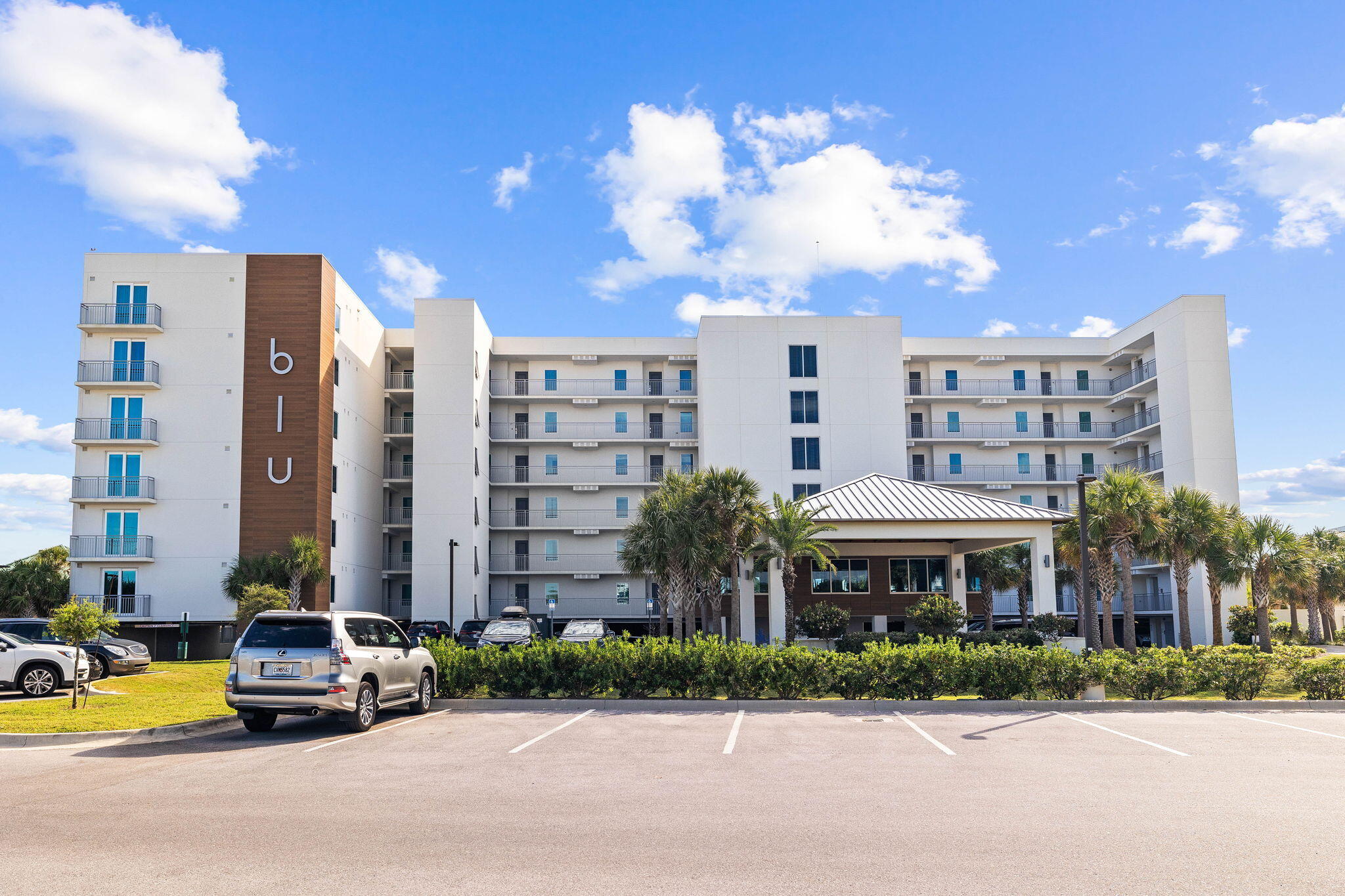 Welcome to BLU! This luxury, gated condominium was built in 2019 and consists of only 6 floors & 47 total units. Situated directly above the emerald green waters of the Gulf of Mexico this unit will exceed your expectations with panoramic views from the balcony, along with stunning water views from the master bedroom and living areas. Featuring an open concept design, this unit offers 3 bedrooms, 3 bathrooms, a media room, full size laundry room with a new washer & dryer, and 235sf of gulf front terrace. Interior finishes include: porcelain tile flooring throughout, a gourmet kitchen with quartz countertops, stainless GE appliances including a gas cooktop & double ovens, a tile backsplash, custom cabinetry with soft close doors & drawers, and California closets in pantry & master closet. This property has NEVER BEEN RENTED, but projections are available. Amenities available at Blu are two resort style pools one of which is heated totaling over 4,500sf and fronting 313' of the Gulf of Mexico. A fire pit & and cabana, grilling area, boardwalk to direct beach access, an onsite fitness room, front entry porte-cochere, and a parking garage. This property comes with 1 deeded parking space in the parking garage along with a storage bin.