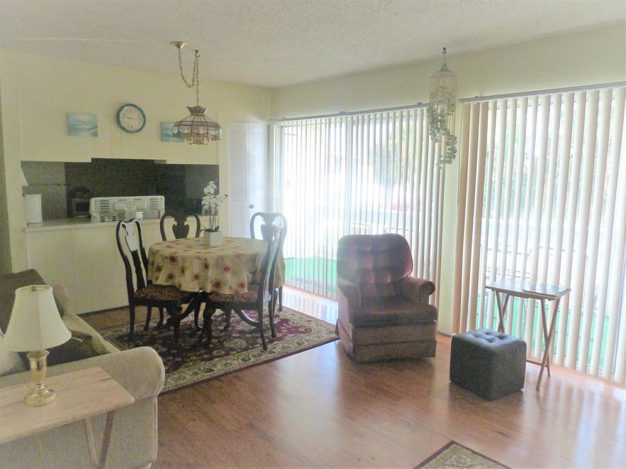 Cute 2 bedroom 2 bath. Looking over greenery & pool. granite counters, hardwood & tile flooring W/D New kitchen & new appliances. Furnished turn key.Great rental unit vacation or long term. Centrally located. Close to the Beach, Restaurants, Shopping & Entertainment. Amenities include: 3 pools, tennis, outdoor grills, community room, Buyer to verify all dimensions.