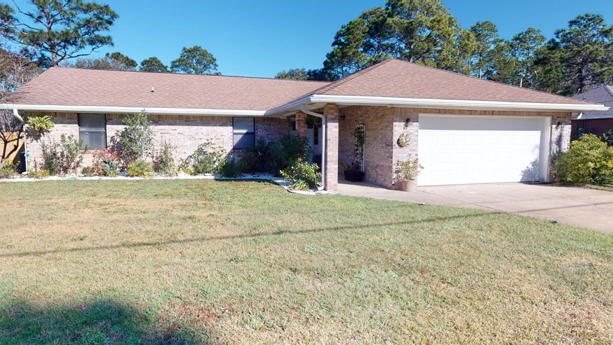 Home....This 3 bedroom/2 bath all brick home has been updated and remodeled into a beautiful place you will not want to leave.  New vinyl plank flooring, updated and functional kitchen with granite and all new stainless steel appliances.  All new light fixtures and ceiling fans throughout.  The redesigned family room is chic and inviting with an option to add a wood burning feature. A screened enclosed patio is perfect for your outdoor enjoyment, bug free.  Check out the covered  structure that currently is used for outdoor entertaining,  add a boat and store your RV.  Already has electric and water.  Plans approved and on file with the Association to enclose and finish.  New hurricane rated garage door and a huge backyard.  Enjoy access to the multi million dollar  Recreation Complex.