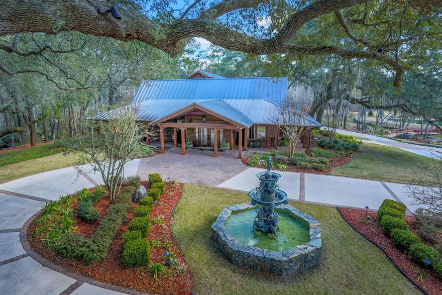 Find your own piece of paradise at this very special estate and ranch known as Phalti. An exquisite main house and separate bunk house are set on nearly 39 acres of natural beauty, including irrigated pasture land, lake/pond, mature trees, and creek access leading to Alaqua Bayou and the Choctawhatchee Bay (navigable by small boat)!There are many options for entertaining your guests: a large bar area near the wine cellar and formal dining room, a living room with fireplace adjacent to the grand gourmet kitchen, plus a huge family rec room/pool room with gorgeous pool/spa/waterfall, summer kitchen, billiards, large stone fireplace, and so much moreall underroof for year-round enjoyment!
