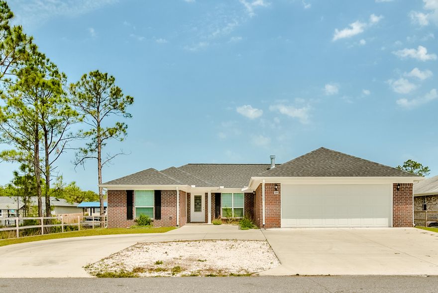 Nearly new canal front home in desirable Polynesian Islands with 70 ft. of canal  frontage and easy access to the bay!  The home boasts an open floor plan with a lovely fireplace as the focal point. Tile flooring extends throughout, so low maintenance. Circular driveway adds to the curb appeal as well as provides extra parking in addition to the 2-car garage. Designed with a split floor plan this home offers a spacious master suite with a master bath soaker tub, separate shower and walk in closet. You will love the fact that the home has tile throughout, no carpet. You could easily add a dock with a boat lift for deep water access.  Current lease ends at the end of June. Please give a 24 hour notice for showings. Schedule your appointment today!*Room dimensions to be verified by buyer.