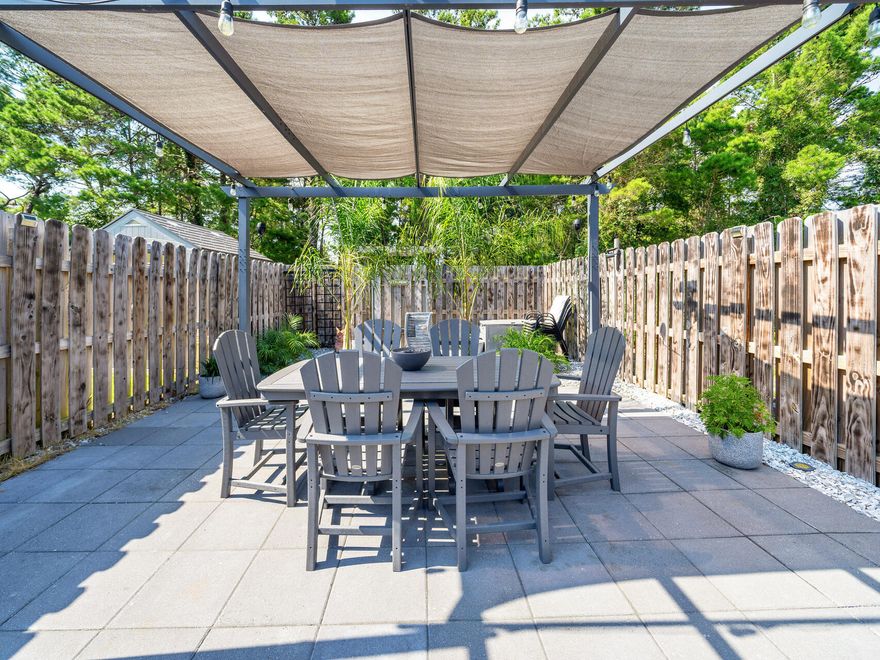 Welcome to this charming townhome in the sought-after Escada community of Santa Rosa Beach. This updated home features two bedrooms and a loft, perfect for an office. The upstairs master bedroom includes an ensuite bath, while the ground floor bedroom offers a spacious walk-in closet. Enjoy the newly landscaped, fully fenced backyard with a hot tub and pergola--ideal for entertaining or relaxing. The remodeled kitchen boasts 42'' cabinets and Samsung appliances, complemented by an updated pantry and laundry room. The new LVP flooring throughout, the additional 4 season room and updated bathrooms are just a few of the recent updates. Located just minutes from the pristine beaches of 30A, and only a few doors away from the community pool and nature trails, this centrally located home provides both tranquility and convenience.