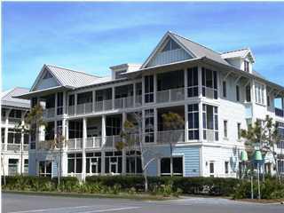 Located in the Town Center of Watercolor, this beautiful two bedroom condo can easily take advantage of all that Watercolor has to offer. It is steps away from the Beach Club, Boathouse and Watercolor's restaurants and shops. Both bedrooms, each with an en suite bathroom, are located on the first level. A private screened porch is off of the master bedroom. The kitchen, dining room and family room are located on the second level. A comfortably furnished porch is located off the family room. Both levels have exterior entrances that are close to the building elevator making access easy for those unable to use the staircase. The condo is being sold fully furnished with minor exclusions. Buyers to verify all dimensions.