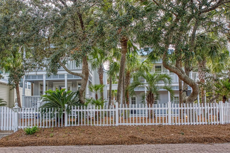 Great home in the gated Old Florida Beach Neighborhood. Extra large corner lot beautifully landscaped. You can enjoy the tropical paradise from one of the seven porches as you admire the 28 palm trees and listen to the surf. The main house features three bedrooms and three full baths. Enjoy the gulf view from the master bedroom balcony! There are several new updates: Kitchen, first floor flooring, tank-less water heater, gas fireplace, washing machine, exterior paint job (spring 2020), and newer AC units. Additionally, there is a two bedroom/two bath guest house that includes a full kitchen and brand new washer/dryer. There is also a newly finished bonus room with a half bath, the opportunities with this space are endless. This entire property could be a residence, a rental, or both.