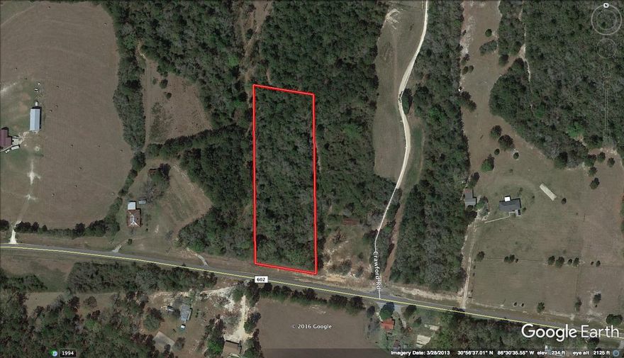 Paved road beautiful large tree Homesite! Bring the horses and the floor plans!