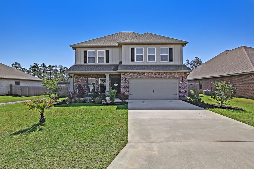 Welcome to this beautiful brick and vinyl craftsman 4 bedroom two-story home! Large great room downstairs that opens up to the dining area and kitchen. The kitchen features a breakfast bar, granite countertops and stainless steel appliances. Wood look vinyl plank in all wet areas, first floor great room and dining area. The primary suite is located on the first floor with a large walk-in closet. The primary bath boasts dual granite vanities, separate tile shower, and a linen closet. Additional bedrooms are upstairs with plenty of closet space. Separate living area that can be used as office, seating area or game room for kids! Wi-Fi enabled sprinkler system. Large backyard with plenty of room to add a pool!