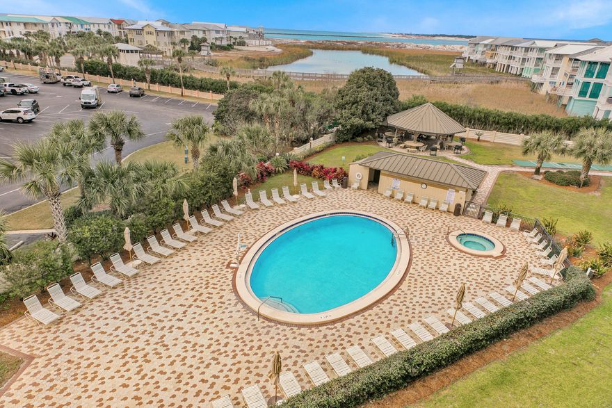 A beautiful 2 bedroom 2 bathroom condominium in the popular Islander on Gulf Shore Dr. is now ready for you, the new owner. Enjoy amazing multicolor sunset views as the light shimmers off of Lake Christina and the Destin Pass. Nicely decorated throughout with updated LVP flooring in the living area and kitchen. The nice sized kitchen has granite counters with bar seating. This unit is turn-key and ready to be your rental machine. The Islander amenities includes tennis courts, pools, hot tubs, covered BBQ gazebo, exercise room. Unit 511 has bookings in 2022 for the rest of February, much of March and April, and some in May. And of course, we can't forget the famous sugar white sand of our Destin beaches just steps from the Islander. Make this a must see. New owner must agree to honor any va