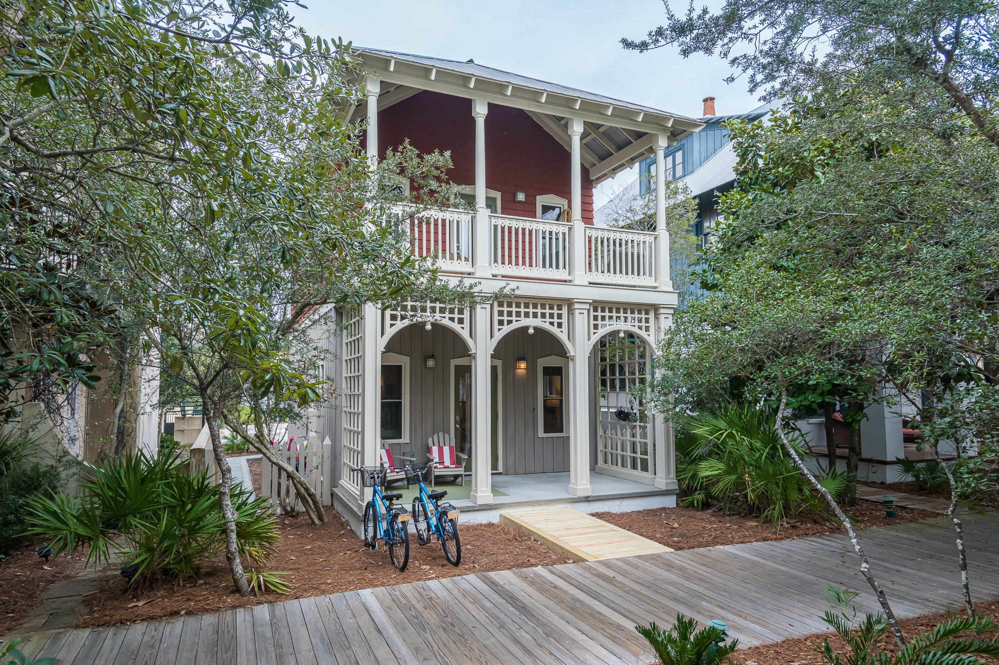 Here's your opportunity to own the most charming cottage perfectly located on a boardwalk and a block from town center. This two bedroom cottage offers an open concept living space, plenty of outdoor living and porches bringing the indoor living space out with lounge areas, privacy and shade. Expansion of the main house, a private pool and/or carriage house can be added with town architect approval. Previously approved plans for an expansion are available upon request. An excellent rental income producer, this home is offered fully furnished and rental ready.