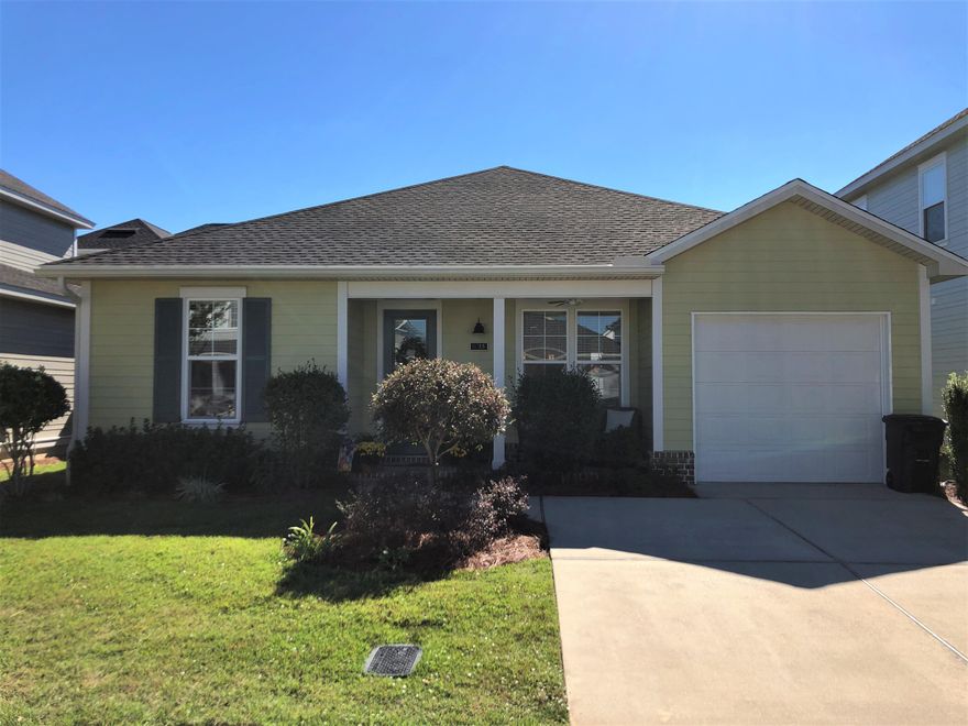 BEAUTIFULLY KEPT (4) yr old, single-story plan w/2br, 2bth w/office & 1 car garage, perfect for anyone downsizing or a coastal 2nd home. The cushy OFFICE is a plus & the charming kitchen adorns granite counter tops, glass backsplash & stainless steel appliances. Bedrooms are spacious w/Master suite having a walk-in closet, dual vanity & beautiful tiled master shower. Laminate wood flooring in main areas, carpeted bedrooms, 9'ft ceilings, 8'ft doors, recess lighting throughout and fenced backyard. Wonderfully-kept community w/HOA lawn service, community pool, dog park, playground & fully equipped exercise room! The overall detail of the homes & community is unparalleled & sets itself apart. Bar None,  best overall value in the area. Come & see for yourself all that this home has to offer!