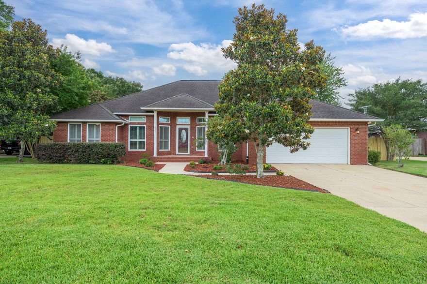 Welcome to this beautiful brick home located in the highly desirable and meticulously maintained Hammersmith neighborhood in Pace! Perfectly situated on nearly half an acre, this spacious 4-bedroom, 3-bathroom home with a screen-enclosed pool offers a blend of comfort, style, and functionality--all in a prime, central location. Step inside to find soaring ceilings and an abundance of natural light streaming through plantation shutters. The inviting living room features a cozy fireplace, while the adjacent kitchen boasts travertine tile countertops, ample cabinetry, and a large pantry--perfect for any home chef. A charming breakfast nook sits just off the kitchen, with a formal dining room on the other side. The split primary suite offers privacy and space, with a massive en-suite bathroom t hat includes a jetted tub, walk-in shower, dual vanities, water closet, and an oversized walk-in closet. The remaining three bedrooms are tucked away on the opposite side of the home, with a full bath conveniently located between them. A third full bathroom is perfectly situated just off the pool area, offering direct outdoor accessideal for rinsing off after a swim without tracking water through the house. An additional bonus room at the front of the home adds flexibility, making it an ideal home office, gym, or playroom. Step outside to your own private oasis! The screen-enclosed sparkling pool is the centerpiece of the lush, tree-lined backyard, providing the perfect retreat for relaxing or entertaining. Enjoy the built-in TV while lounging poolside, let the kids and pets run free in the spacious yard, or enjoy your own garden sanctuary. This home truly has it allFEMA wind mitigation status, a 2 car garage, a pool, space, charm, and a location that can't be beat!