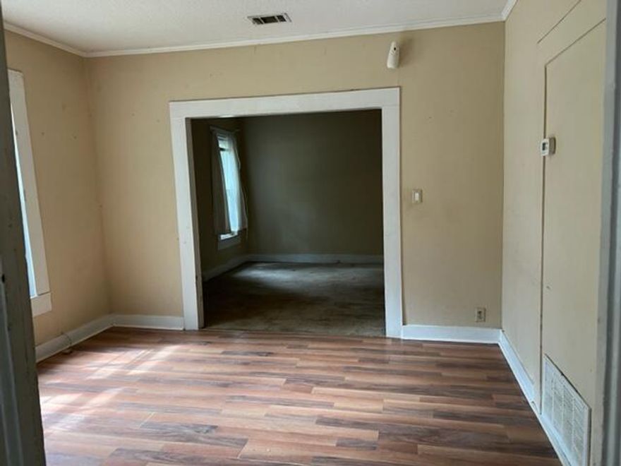 Older home needs work. There were upgrades several years ago but well abused now... HVAC is 3 years old. Home features 3 bedroom, 1 bath with dining and living room. Bedroom are good size. Large fenced back. Lots of fruit trees out front.Will need flooring and paint. There is a metal roof. Looking for a cash sale but may consider owner financing.Sold as is.