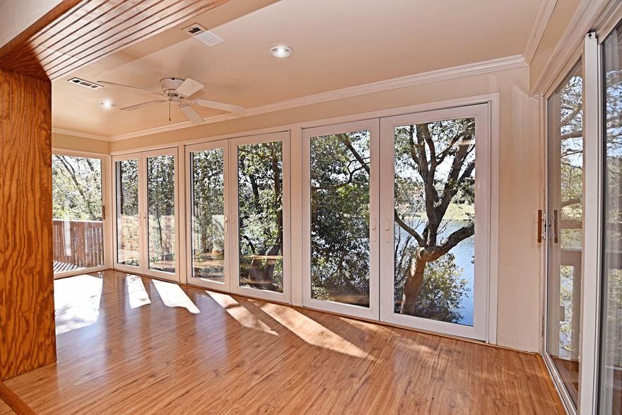 Sprawling 4bed/3.5bath 4,458 sq/ft lakefront home in lovely Lake Sharon Estates. This home offers space galore w/ 1st & 2nd floors and finished basement! First floor includes: huge living area w/ wood floors & fireplace; glass- enclosed sitting area w/ floor to ceiling windows and deck access; large kitchen w/ tons of cabinet space, stainless apps, tile flooring & granite counter-tops; spacious master w/ his & hers closets and en-suite w/ double vanity; office space, large laundry/utility room & half-bath. Upstairs are 2 additional split bedrooms, both sizable with ample closet space along with a full bath & attic storage. Half of the finished basement sports a huge open space great for a recreation, work or living area. The other half provides the added bonus of an ''efficiency''