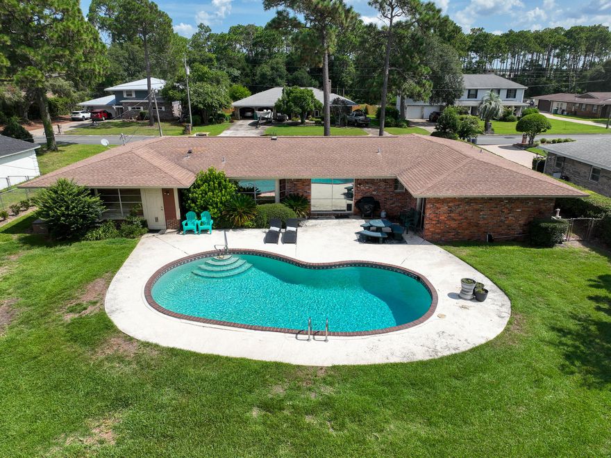 Amazing Neighborhood! Brick 4 Bedroom 2.5 Bath Golf Course Home On Hole #5 Shalimar Point. No H.O.A., Private Pool, Excellent Family Home. Bonus Pool Room, Living Room, Dining Room, Amazing Yard!