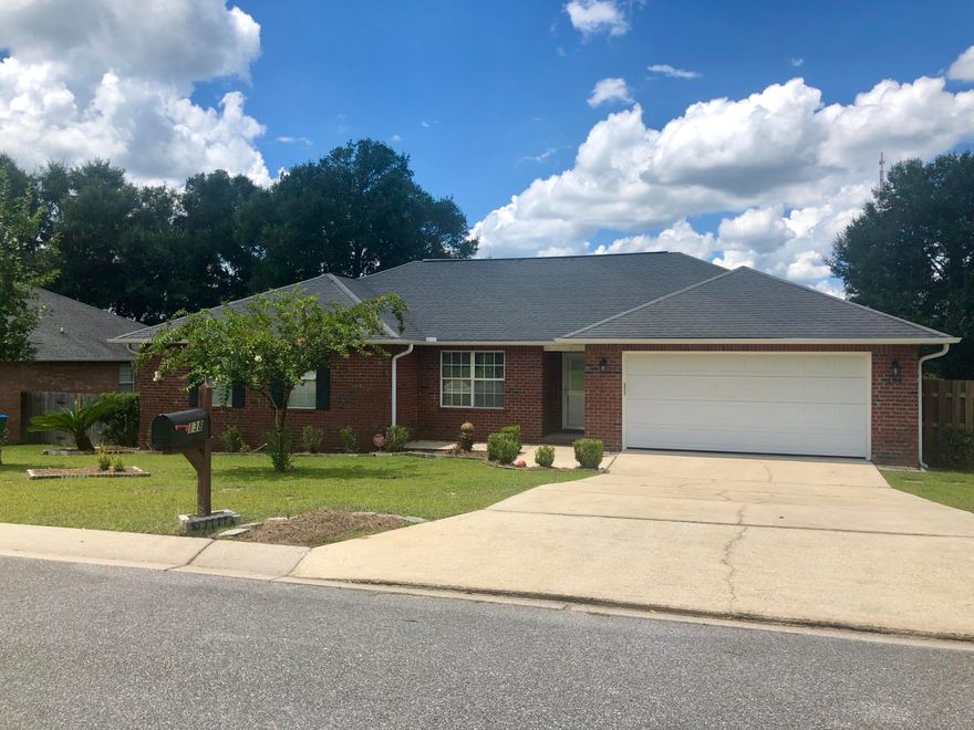 Great location and price with a BIG backyard! This 4 bedroom 2 bath all brick home home features an open floor plan and spacious layout. The vaulted ceiling and big windows make this home feel bright and cheery. The kitchen features a large breakfast bar, plenty of cabinetry and counter space and the refrigerator will convey! The master suite features a large walk in closet and tray ceiling and spacious private bath with double sinks. The split bedroom design gives everyone their own sense of privacy. If you are looking for a great home in a great neighborhood, and you want to be close to schools, shopping, and the area military bases, this home is a MUST SEE! Conveniently located in Old Bethel Estates with access from both HWY 85 and HWY 90. Call to schedule your private showing today