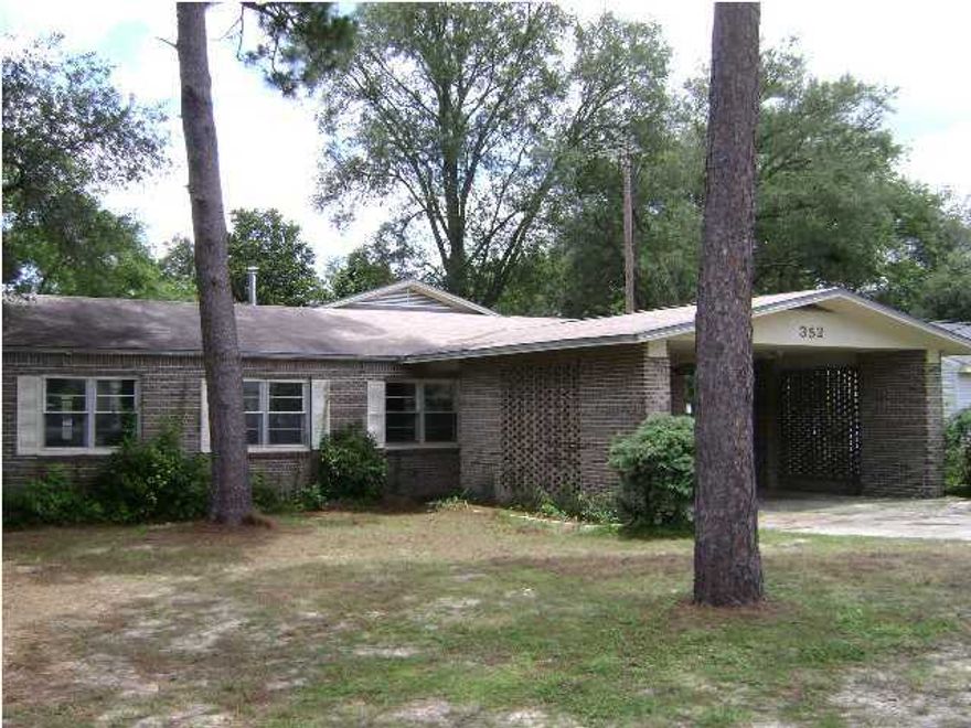 Third $5,000 PRICE REDUCTION!! Owner says sell -- will consider all offers. Comfortable 4 bedroom 2 bath home on good size lot in Valparaiso. Close to (1) Eglin Air Force Base, the area's largest employer, (2) Northwest Florida State College, (3) top flight schools including award winning Niceville High School, medical facilities and recreation: golf, tennis and beautiful beaches on the Emerald Coast. Home features two living areas with wood burning stove off kitchen. Screened in porch offers relaxation. Large fenced back yard with multi purpose out building. Light pole in rear yard adds security. Large carport with garage behind. Garage offers overhead storage. Electrical updated. Take a look at this ready to go home for family or investment. Quick close possible. Buyer to verify