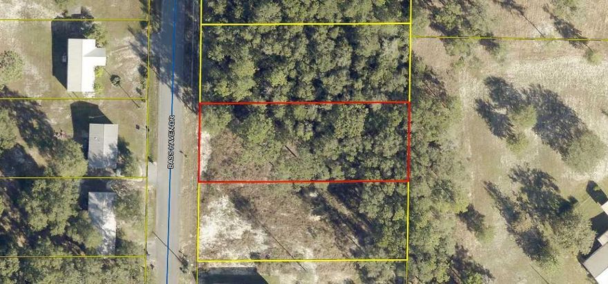 GREAT BUILDABLE LOT! Partially cleared lot with an 8' privacy fence across the back of the lot. Build your new home or bring your mobile home. Tap fee has been paid and land has been surveyed. Call for a showing today!