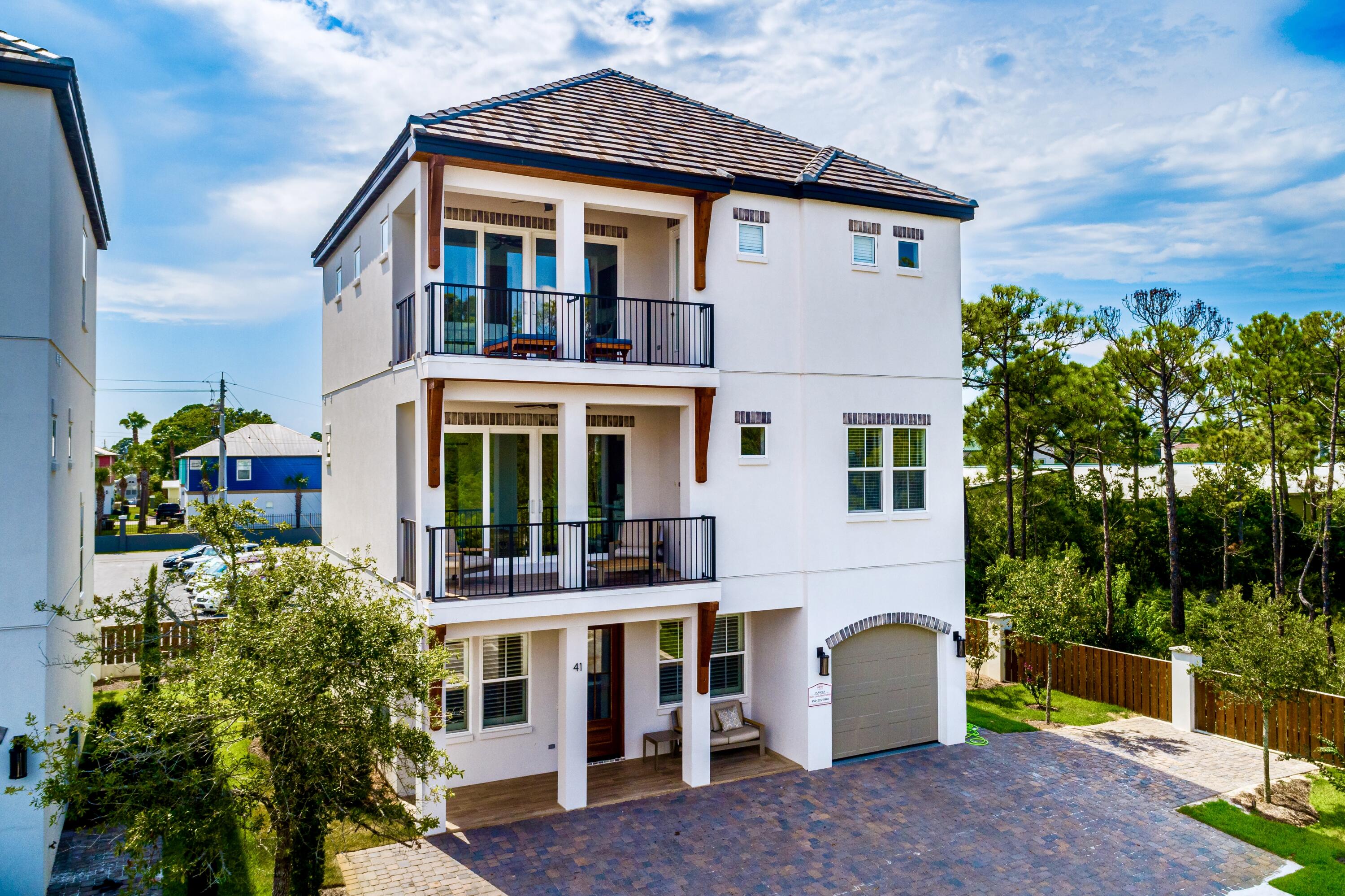 Pristine 2020 built home paired with exceptional finishes and resort style amenities. This beautiful beachside retreat has nearly $200,000 in rental income for 2022 with 14 days of owner blocks during high season and $91,000 on the books so far for 2023. 41 Mellow Way is prominently positioned just a few tiers back from the Gulf of Mexico and a short walk or golf cart ride to Miramar Beach's largest public beach access. Appointed with top of line appliances, 66'' built in fridge/freezer, quartz countertops, and hardwood floors throughout. Featuring two living rooms, 7 bedrooms, 6 & 1 half bathrooms, and two large balconies, this rental machine was thoughtfully designed to optimize sleeping capacity while giving everyone space to relax.