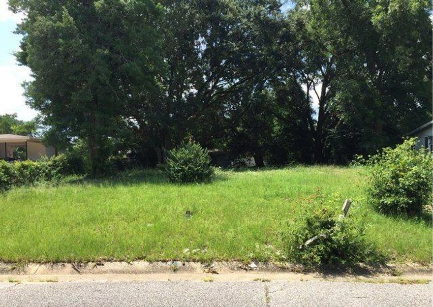 REO ~ Vacant Lot in Crescent Lake offers a convenient location to shopping, dining & the beach. Come build your dream home.
