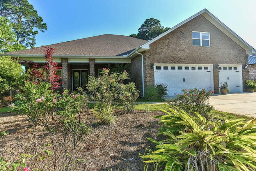 This custom built home offers 4 bedrooms and 2 and 1/2 baths with an open floor plan perfect for entertaining. Some special features include an oversized 3 car garage, gas-fireplace, energy efficient foam insulation, granite countertops, fenced backyard with patio, bonus room, 10'' crown molding, tray ceilings and much more. This house is truly a gem and move-in ready. Buyer to verify all dimensions.