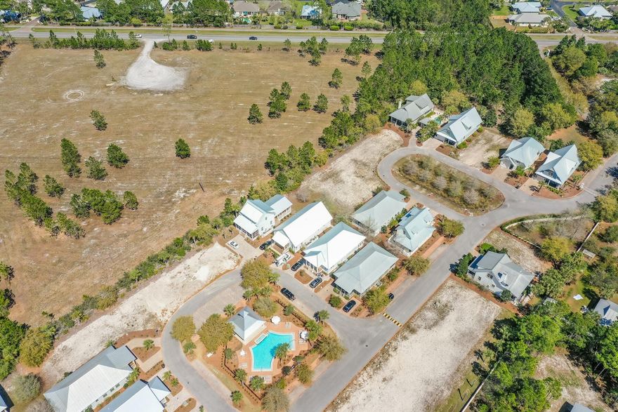 Lot 10 is located in Phase 2 of Cypress Dunes! John Willis Homes is the exclusive builder and has built all the amazing homes in the community. John Willis is known for his custom homes with quality design selections and craftsmanship. There are 3 different floor plans that fit this lot. Cypress Dunes is completely surrounded by Topsail Hill State Park and nature. The state of the art amenity center has Gulf of Mexico views , an infinity edge pool, a fully equipped workout facility, sunset deck, outdoor fireplace, owners room with a 90 in TV and commercial kitchen, a second pool in Phase 2, tennis courts, boardwalks through nature and Cypress Ponds! The well known Sandestin Golf & Beach Resort is just 5 minutes away with 4 award winning championship golf courses, 15 world class tennis courts, 113-slip marina, water sports and the famous Baytowne Wharf. Grand Boulevard Shopping Center offers a movie theater, Publix grocery, Sacred Heart Hospital, name brand shopping and restaurants like Flemings Steak House, PF Chang's, and Emeril's.