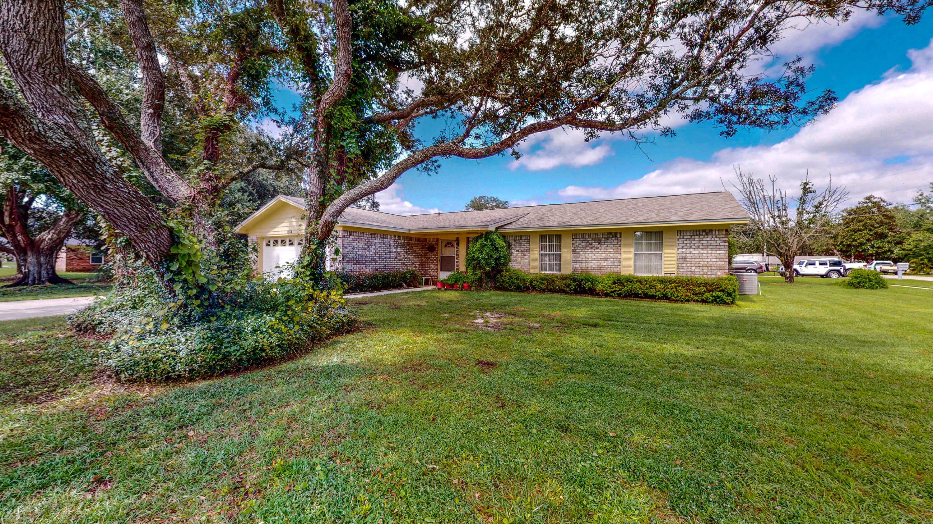 ORDERS CANCELLED! :( BACK ON MARKET An ORIGINAL OWNER home. The first and only owner has lovingly cared for and maintained this lovely home. The home has a brick exterior which was recently pressure washed, the roof was installed in 05/21, water tank 01/19 adding to the low maintenance. Featuring a split bedroom floorplan there is plenty of room for all. Two good sized bedrooms and a hall bathroom are off the hallway at one end of the Living Room. The Master bedroom and bathroom are located at the opposite end of the home. The bedroom itself is well sized with a large walk in closet and the bathroom includes a double sink vanity. From the dining area walk out to the screened porch and enjoy the lovely yard. The location is perfect for commutes to the many military bases in the area