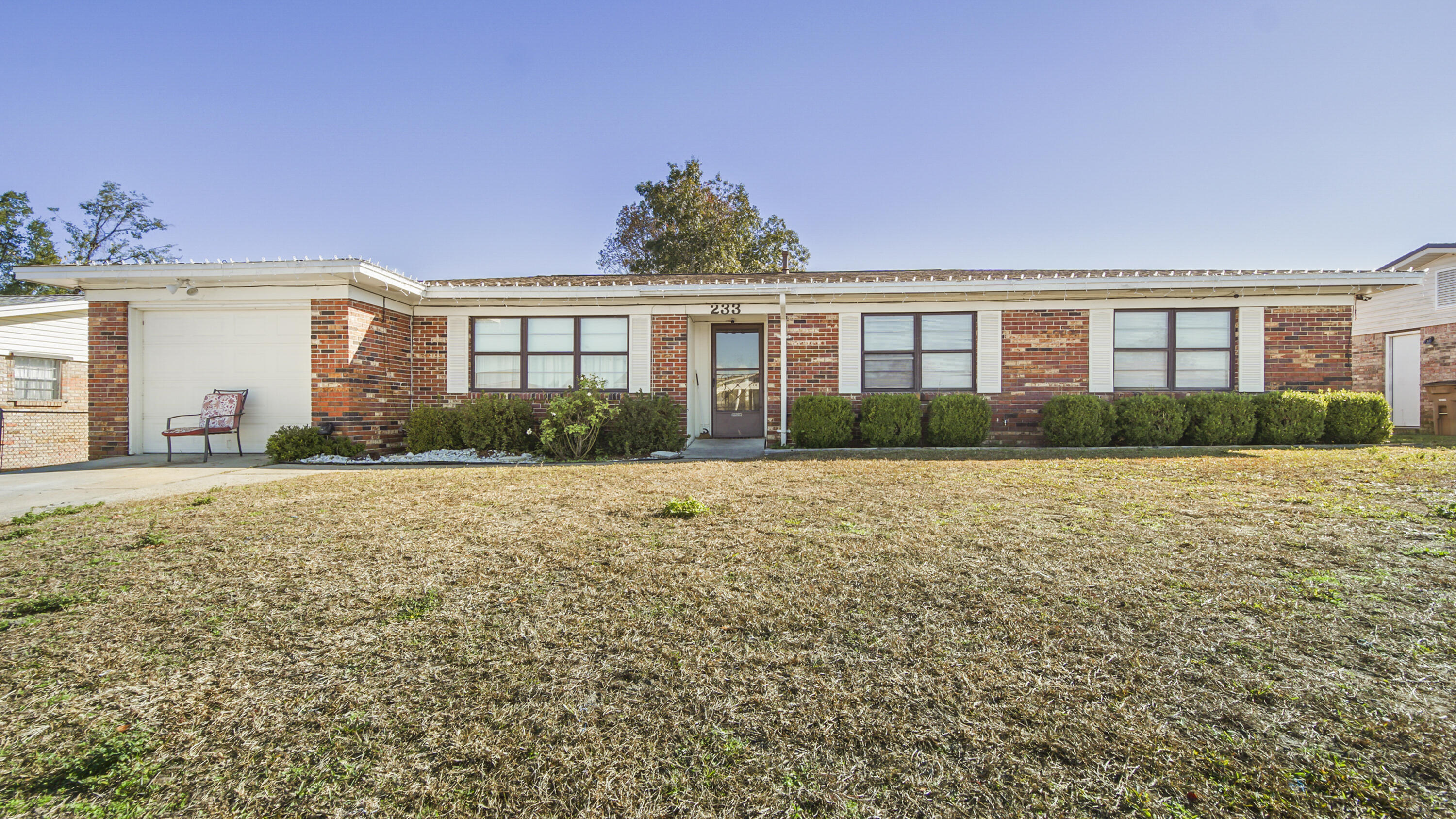 Welcome to 233 S. Kimbrel Ave, a remarkable all-brick residence that seamlessly combines comfort, accessibility, and practicality. This home is an excellent match for first-time buyers, military personnel, or retirees, offering a serene lifestyle while being conveniently located near major amenities and destinations. Key Features; home offers a Privacy-Fenced Backyard: Revel in the tranquility of your own expansive backyard, complemented by two sizable sheds. Irrigation System: Enjoy a lush, green garden with an efficient irrigation system powered by a private wellkeeping maintenance costs low. Natural Gas Ready: Featuring a gas hot water heater and the potential for future natural gas installations, this home offers both efficiency and adaptability. This property is perfectly positioned for those seeking an uncomplicated yet well-located home. It's ideal for, First-Time Home Buyer, Military Personnel due to its Proximity to Tyndall Air Force Base, or the person that enjoys a low-maintenance haven for a peaceful retirement, with easy access to leisure and amenities. Outstanding Location, Situated just a short drive from Panama City Beach, this property offers an exceptional lifestyle. Enjoy nearby dining, shopping, and healthcare facilities. Home will not last long, please call today for a tour.