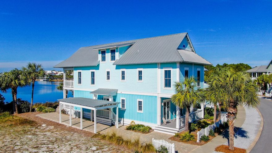 CURRENTLY UNDER CONTRACT, SELLER ACCEPTING BACKUP OFFERS' Over $110k in rentals on the books for 2021 already!! Welcome to Our Fanta-Sea!! If you are looking for a golf cart and pedestrian friendly, yet quiet community, look no further. This Spectacular Lakefront 6 Bedroom 6.5 Bath Carillon Beach Home is Just a Short Walk to the Pristine Waters of the Gulf of Mexico. This Property is rental ready and is a proven and incredible income generating investment property but would also make The Perfect Full-time Residence. Wonderfully Updated and Professionally decorated. This home has five bedrooms, each with its own bathroom and an entire third floor dedicated to kids and teens with a large living/play area, full bath and a bunk area with twelve double bunks!! Two guest bedrooms and the master suite make up the first floor. Off the master bedroom, there is a huge back deck with a relaxing view of Lake Carillon and a sitting area with a decorative fire pit perfect for outdoor entertaining and enjoying evening sunsets. Take the stairs or elevator to the second floor where you find a bright and Open Floor Plan, Breakfast bar, A Gourmet Kitchen with Upgraded Stainless-steel Appliances, Granite Countertops, a Stylish Stainless Farmhouse Sink and Plenty of Cabinet and Counter Space. The living and dining areas offer a bright, friendly and comfortable space to relax, enjoy the views and company of family and friends. Two additional guest rooms and laundry are also on the second floor. In addition, there are not one, but two sets of washers and dryers and two dishwashers. Our Fanta-Sea is Situated next to the East Pool on the banks of Lake Carillon. Take Deeded access (#7) to a one mile stretch of sugar white sandy beach and emerald waters of the Gulf of Mexico. Amenities include Carillon Bell Tower, Lake Carillon, The Beach Pool Club, Lake Carillon Pool a/k/a East Pool, Bellview Park and Pool, Carillon Downtown and Market Street, The Meeting House, Beach Walkovers and Pavillons. And that is just the beginning. Carillon Beach community offers the best of both worlds being located on the west end of Panama City Beach and just minutes from 30a shopping and dining. All measurements, ages and room sizes are approximate. Buyer should verify if important.
