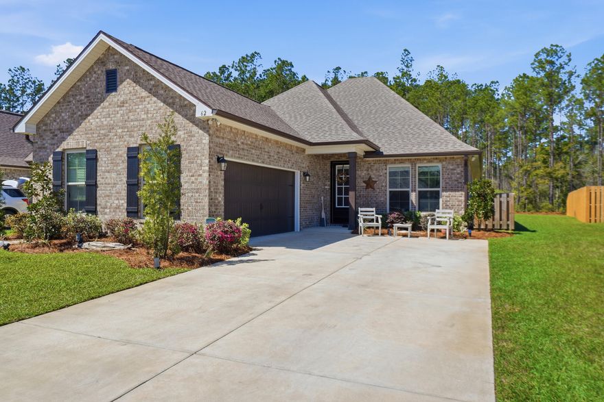 Professional photos and documents are coming soon. Very large lot in Splendor backing up to the preserved area. $20K worth of upgrades. No need to wait for new construction to be built! Exceptional Move-In Ready at 62 Brilliance Blvd. While many are waiting months for new construction in this rapidly growing community, this stunning Manet II NEW residence is available now. Built in 2024, this home offers the pristine feel of a brand-new build without the construction timeline. It has been lightly lived in--less than two years old--and is ready for you to start enjoying the Hammock Bay lifestyle today.Expansive Living & Natural Privacy This floor plan is a standout for its large, open-concept living area, arguably the most spacious living room design offered by the builder. It provides an airy, inviting atmosphere perfect for hosting or quiet evenings at home. Step outside to a spacious backyard that backs up to a peaceful nature preserve, allowing you to enjoy the ultimate privacy and tranquility that nature offers.Premium Interior Upgrades. The owners invested nearly $18,000 in high-quality options to elevate the home's comfort and style:Gourmet Kitchen: Anchored by Vicostone Arctic White Quartz and a premium Tier 2 Cabinet upgrade.Designer Finishes: Enhanced with undercabinet lighting, a Trinsic Stainless Steel faucet, and a stylish NAL Santorini backsplash.Master Suite: The bedroom features a sophisticated tray ceiling, adding a sense of height and refined comfort to the space.Abundant Storage: Features a "his and her" configuration with two spacious walk-in closets, ensuring plenty of room for any wardrobe.Upgraded Flooring: Durable and elegant Ceramic 5 tile flows through the living room, hallways, master bedroom, and all wet areas.Custom Lighting: Features 12 additional LED canned lights, pendant lighting over the island, a decorative foyer fixture, LED interior ceiling fans, and five additional interior electrical outlets.Quality Exterior Construction The home's exterior is designed for both aesthetics and long-term durability:Full Gutter System: Musket Brown gutters encompass the entire home.Classic Materials: Finished with Columbus Stone Chase brick and Estate Linen siding.Refined Entry: Features a Wayne Dalton Sonoma garage door in Brown and additional LED coach lights on each side of the garage.The Hammock Bay Lifestyle Located in Freeport, you are only 22 miles from the famous 30A beaches and minutes from the bay for boating. This home offers the perfect blend of modern sophistication and resort-style amenities. Ownership here includes access to exceptional neighborhood amenities:Creekside Clubhouse: Features a resort-style swimming pool, fitness center, and pickleball and basketball courts.Windmills Town Center: Offers three additional swimming pools and an expansive 8,000 SF fitness center.Owners' Club: A premier social space with a theatre and indoor/outdoor entertaining areas.This move-in-ready gem represents exceptional value. Why wait for a build-site when you can have it all right now?Note: All information provided is deemed reliable and accurate but is not guaranteed. It is the responsibility of the buyer and buyer's agent to verify all measurements, community amenities, and property details.