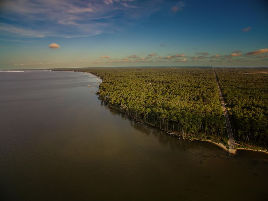 RARE!!!Looking for a beautiful Bay front setting to build your private dream home? Or a development? Would you like to take in gorgeous views year around? Look no further, with 7 acres of undisturbed land and 1100ft of bay frontage you can make your dreams happen! This property is zoned neighborhood infill so it offers many possibilities. If a tranquil Bay front setting is what you're looking for, look no further!!! Let's make a deal!!