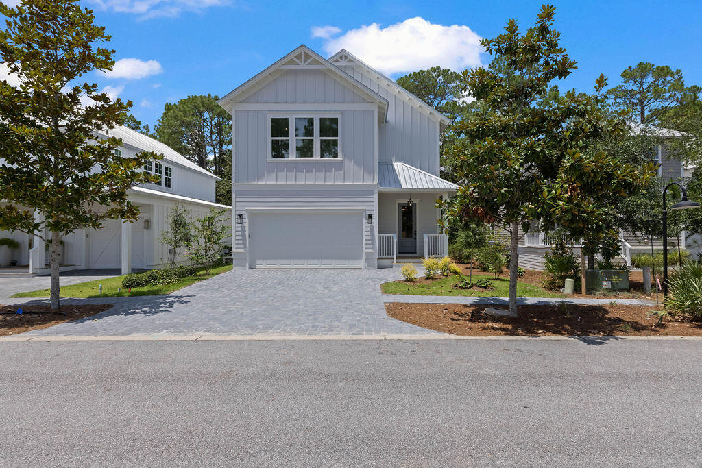 New Construction Home Located in the Gated Community of Hidden Grove. The home will have a primary suite located on the first floor with a large walk-in closet with custom wood shelving. Kitchen and Baths will feature White Shaker Cabinets with Soft Close Door and Drawers. Counter tops are white quartz with slight veining. The second floor has a loft and additionally private junior suite with walk in closet and bath with double vanities. Hidden Grove is a Rental Restricted Neighborhood.