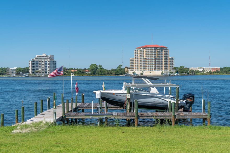 **UNDER CONTRACT WITH A 72 HR KICKOUT CLAUSE* This home is located directly on the Santa Rosa Sound (intercoastal waterway) on beautiful Okaloosa Island. The home is perfect for entertaining with 3 full kitchens, one on each floor.  When you walk into the bottom floor you are greeted with 2 garages on either side and the hallway leads you into the studio apartment space.  The studio is complete with a full kitchen, large living area, full bathroom, and access to the backyard which over looks the Sound.
