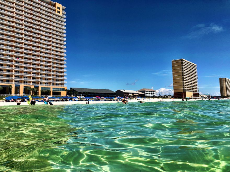 This 2 bedroom, 2 bathroom condo features tile floors throughout, granite countertops, stainless steel appliances, stunning views of the Gulf and much more! Splash offers a lazy river, interactive water park for the little ones, a splash pad for the little, little ones, a dive-in theatre, heated pools, hot tub, exercise facility and poolside bar and grill. This unit is great for a second home or for short term rental investment!