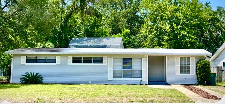 Florida Cottage with that wonderful feel of home!!  A huge screened porch provides room for both additional dining and living space. The home has two separate living spaces, one with a fireplace, an office and four bedroom with two baths. The bathroom floors have fun original tiles. Is a dream garage on your list? The two story garage has a workshop area on the first floor and approx. 400 sq. feet on the second floor. Wonderful possibilities! Centrally located in Fort Walton Beach.  Total living space is 2,678.