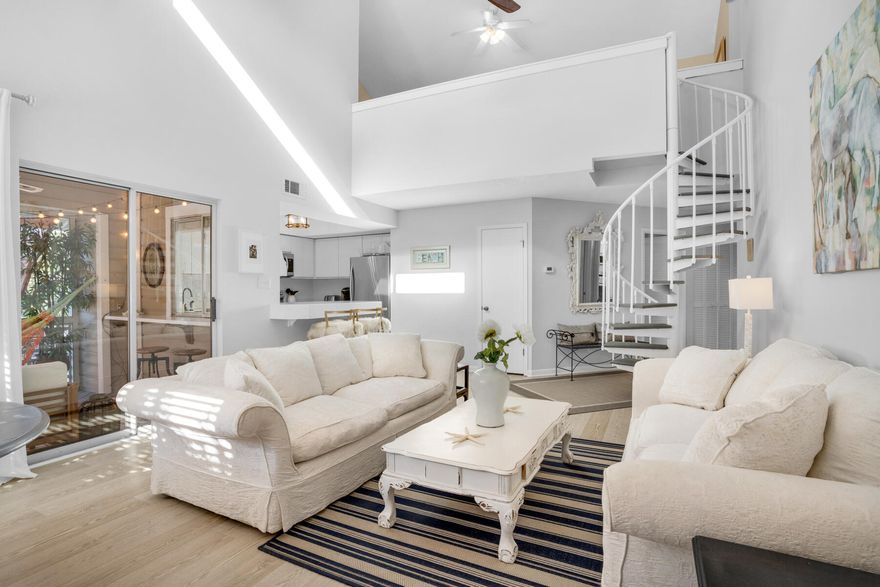 Motivated seller! Take advantage of the lowest priced 3BR 3BA condo in Hidden Dunes.  The amenities in this gated beach community include deeded beach access, 2 resort pools, tennis, pickleball, BBQ grills, fishing lake, playground & more. This unit is very spacious, bright and elegantly appointed at a price that makes it a good investment. You will appreciate this quiet peaceful environment that guests enjoy also. The balcony is cozy with a hammock and a breakfast bar that opens up to the kitchen making entertainment a breeze. The kitchen is well equipped with newer appliances and lighting. The windows have been replaced as well as the floors in the living room and master bedroom. There is new paint throughout giving it a crisp and clean feel.  Hidden Dunes has so much to offer owners &  guests alike. There are 2 bedrooms and baths on the first level and the 2nd floor loft bedroom has a full bath and extra space for guests. The lush mature landscaping offers plenty of shade and relaxing fountains to enhance your leisurely walk throughout the community. The beach is an easy walk or take the tram that operates seasonally. An array of shopping, restaurants, and entertainment are nearby. The HVAC was replaced in 2023.