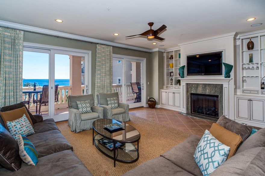 Coastal elegance awaits you! Rising above the highest point on the U.S. Gulf Rim gracious living abounds with views of the piazza and Gulf of Mexico in this luxurious 3rd floor residence, B301, in beautiful gated Bella Vita at Blue Mountain Beach. Discover a gem within Bella Vita overlooking the sparkling fountain as the piazza view unfolds to the gulf. The owners are offering this premier condominium furnished. The well conceived design is all about family, entertaining and effortless beach living. This floor plan is a favorite for it's graciously sized rooms and end location, flooding the master bedroom and corner guest room in sunlight. The Seller added a beautiful granite surround fireplace and built-ins in the spacious living room. The home's open floor plan is flooded with light