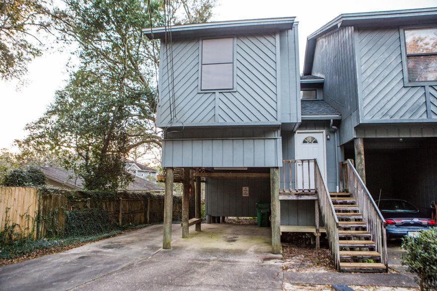 Quiet paradise situated on deepwater bayou! Efficient two bedroom two bath end unit featuring water view and deeded access with community dock. Enjoy the peaceful view on the newly replaced upper and lower balconies. Unit is freshly painted and new flooring has been installed. The plumbing has been updated. Roof was replaced 2018, HVAC in 2017. Water heater replaced 2019. Buyer to verify all info.