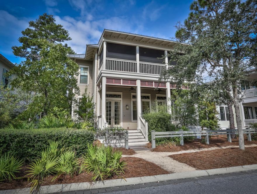 Great price on this six-bedroom home in Ph 3 of WaterColor, FL. A LOCAL RENTAL COMPANY WILL GUARANTEE $183,035 IN GROSS RENTAL INCOME and the property is being sold fully furnished. A two-car garage with carriage house adds value to this already spectacular home. Three large porches - one screened and another with a fireplace - allow guests to enjoy the great Florida weather year round. Hardwood floors run throughout the living areas of this home. Enter through the front door and you're greeted to a large open living, dining and kitchen area, which is ideal for family get togethers and entertaining. There are two master bedrooms, one on each level.