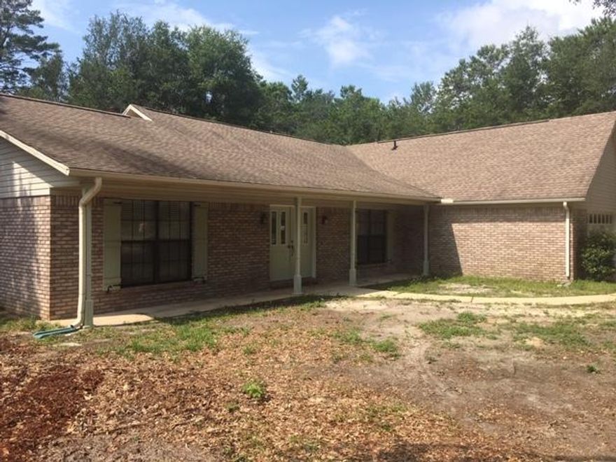 Just down the street from beautiful Florida Park this nicely updated open floor plan is ready for new tenants. Kitchen has black granite counter tops with butcher block counter on island. Island has garbage disposal and sink, stainless refrigerator and black appliances, large indoor laundry with cabinets and sink. Split bedrooms, master with his & hers sinks, jacuzzi tub and large walk in closet with window! Big screened in porch, outside has open patio with firepit. Owner will allow small dog only, no cats. Requires a non-refundable pet fee and a refundable pet deposit. All pets must be current on shots and be spayed or neutered. Tenants require to maintain renter's liability insurance while occupying the home. Any person 18 years old or older must complete separate applications