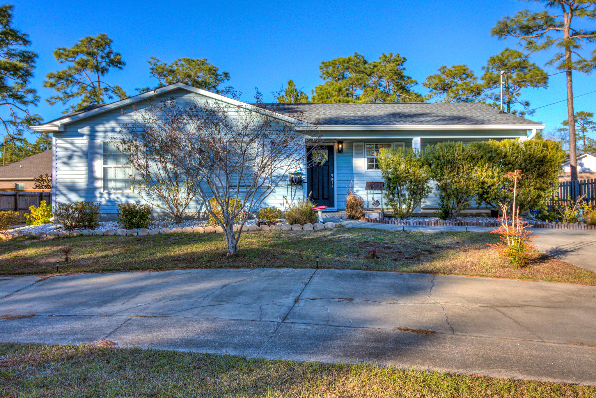 Updated 3BR/2BA home perfectly located minutes from the Bay and the white beaches of the Gulf! The home sits on almost a 1/4 acre, enclosed back yard with large storage shed offering electric and circular driveway with plenty of parking and no HOA! The interior of the home offers tile flooring through out, granite counters, ss appliances, updated bathrooms, new roof 2016, new A/C 2015, new entry and side door, reverse osmosis and termite bond.