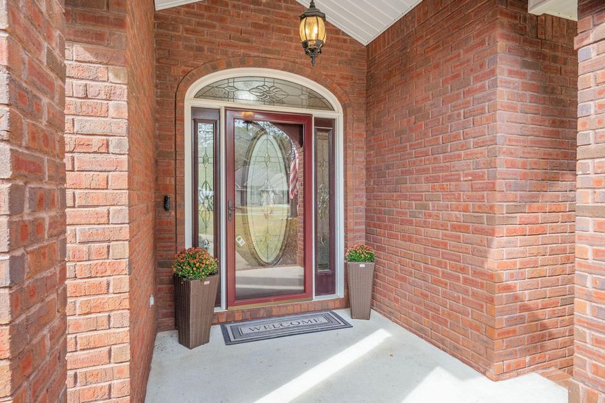 This custom waterfront home in Magnolia Lake Estates is the one you walk into and instantly know you want. The lake views from the huge screened porch feel like a daily reset button. The kitchen is sharp with newer appliances, but the custom butler's pantry is next level with abundant cabinetry, beautiful prep space, and the kind of organization you only find in a true custom build. Storage is tucked everywhere, including a custom utility room that makes everyday life easier. Enjoy a formal dining room for hosting and a breakfast nook with peaceful water views. The waterfront primary suite delivers pure comfort with a fantastic walk in closet and a spa worthy cultured marble shower. Magnolia Lake Estates offers a peaceful, welcoming community that truly elevates your lifestyle.