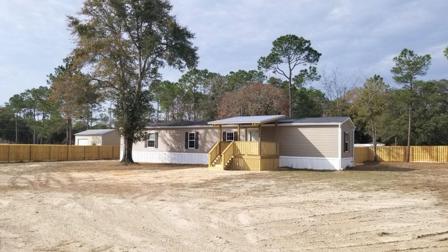 Affordable Living In Freeport w/ Large Lot (0.72 Acres). New Privacy Fence Surrounds The Land. New Appliances, New Decks (Front & Back). Nice Place To Call Home In Fast Growing Freeport FL. This Home Affords You Room For Additional Buildings, Park Your RV, Build A Garage, Plant A Garden, etc. Plenty Of Space For Family, Vehicles, & Pets Here. In The Vicinity Of Neighborhood Is E.O. Wilson Biofilia Center, Alaqua Animal Rescue, & Windswept Dunes Golf Course (1.5 Miles Away!) Make Time To Check Out This Property Located Only 5.6 Miles To Publix, Ace Hardware, Restaurants, Etc. Nearest Airport Is ECP Just 25 Miles To The East. So Easy To Head South To The Beaches Of South Walton & Scenic 30-A. North Is DeFuniak Springs & I-10. No HOA To Tell You What To Do! Easy Living. Schedule A Visit Now!