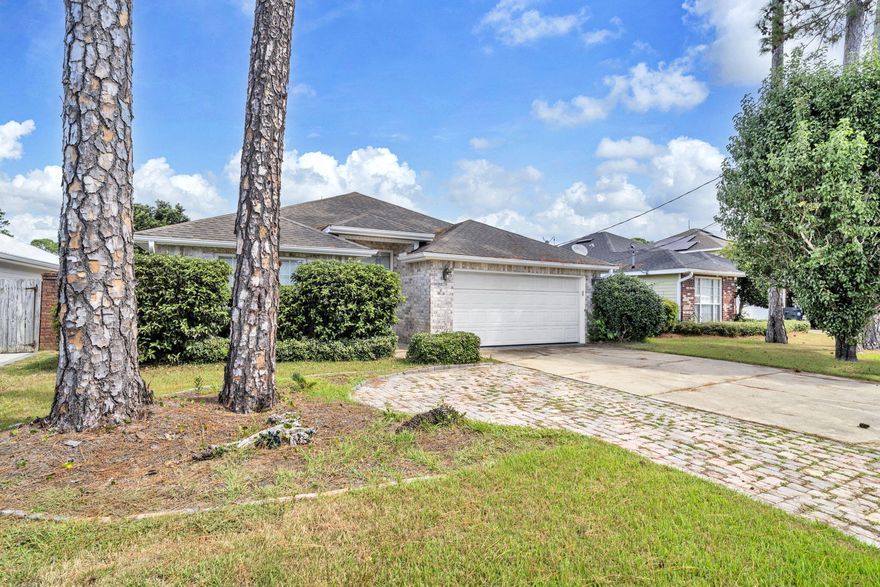Nestled in the well-loved community of Olde Florida Lakes, this home enjoys a prime location close to the best of Santa Rosa Beach and Destin -- from sugar-white beaches to local dining and boutique shopping. Inside, you'll find three comfortable bedrooms and two baths designed for easy living. Tall 10-foot ceilings throughout and a dramatic 12-foot ceiling in the living room make the home feel bright and spacious, while the fireplace provides the perfect cozy gathering spot.  The kitchen features a convenient pantry and long countertops that make meal prep easy and enjoyable.  Out back, a fully fenced yard provides the perfect play space for kids and pets or a blank canvas for an enthusiastic gardener.  The public schools are A+ rated.