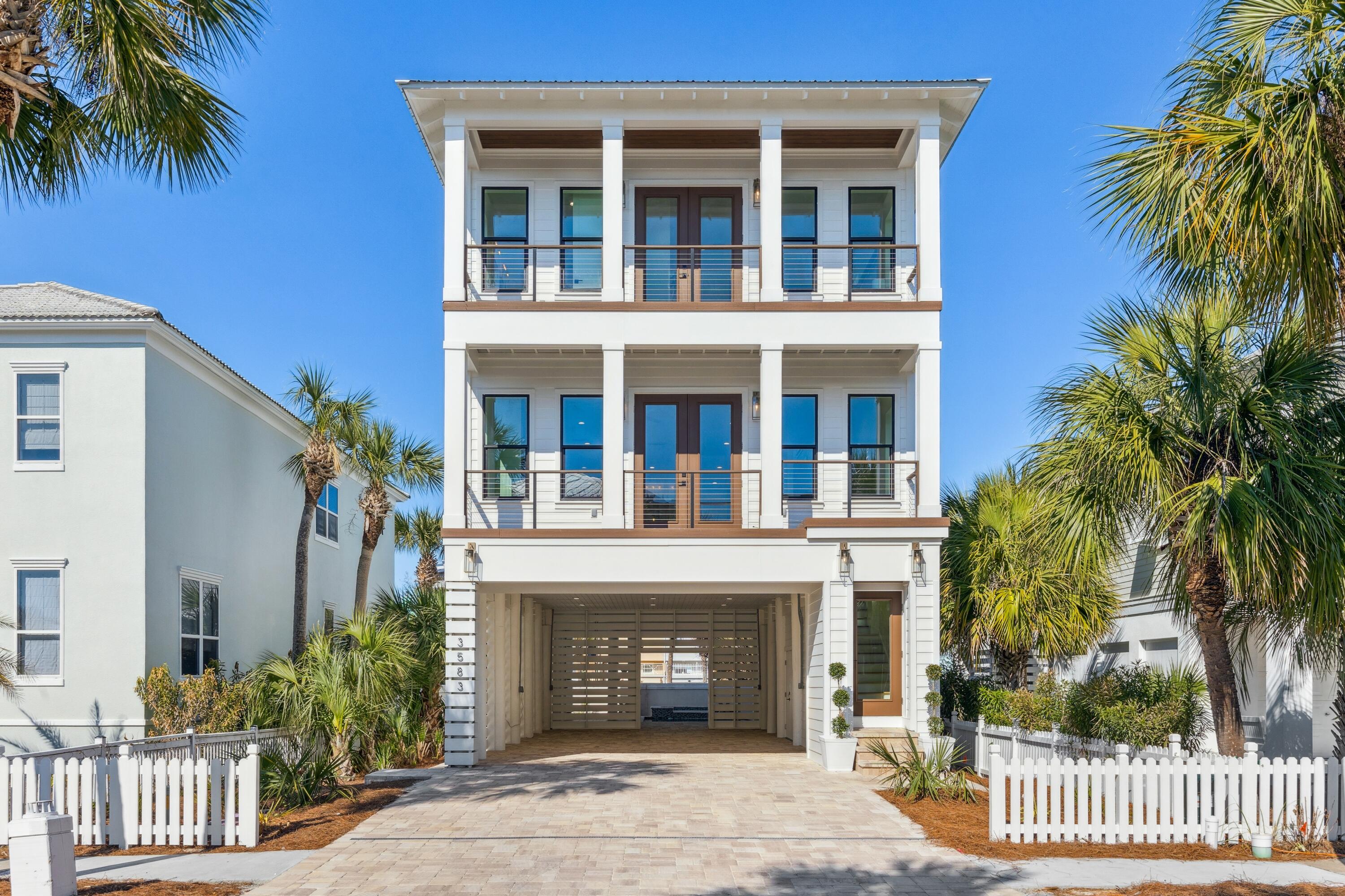 Brand new construction - water views from all third floor bedrooms - fully furnished and completely turnkey to enjoy as a primary residence, vacation home, or short term rental. Uniquely located at the tip of Destin Pass, Destin Pointe is the premier luxury gated beach community in Destin. This neighborhood offers three pools, including an infinity pool overlooking the Gulf; 24-hour security; and deeded beach access to more than 2,000 linear feet of the area's pure white sand beaches. It also offers unique access to Emerald Grande Beach, Destin's East Jetties, and walking distance to Norriego Point. This brand new home features 4 bedrooms, 4.5 baths, and sleeps 12, making it a great short-term rental or a perfect family home. Every bedroom has its own large en-suite bathroom, with the three front and rear facing bedrooms featuring their own private decks.
Built to the latest structural design codes (completed March 2025), it is engineered for lasting value and carries a 1-year new home warranty from one of the most respected and long-established builders in Destin, with a 30 year track record of delivering some of the finest luxury beach houses in the region.
The ground level has two covered parking spaces, large secured storage area, and hot tub with a waterfall spillover into a partially covered heated/cooled pool.
The second floor offers an open-concept design featuring 10-foot ceilings, gourmet Thermador kitchen with extra-large refrigerator, 8-foot solid core doors, large island with gold veining quartz countertops, custom shaker-style cabinetry, and a gas fireplace.
Highly rare in this location and price range, each bedroom on the third floor features clear water views, full on-suite bathrooms, and brand new furniture. The setup is ideal for guests to watch boats in the Pass or fireworks over Destin Harbor.
Residents and guests enjoy Destin Pointe's three stunning pools, including a brand-new Gulf-front infinity pool and two lighted tennis courts and shuffleboard, tempting renters to stay put.
Call the Water Taxi to take you for a tour or take advantage of other close amenities, including fishing and snorkeling / scuba diving Destin's east jetties or the Gulf, shopping and dining at Harborwalk Village, and several golf courses just minutes away.
Live the Destin dream with everything at your fingertips and peace of mind included. Don't miss out - this is your chance to own a piece of coastal paradise!