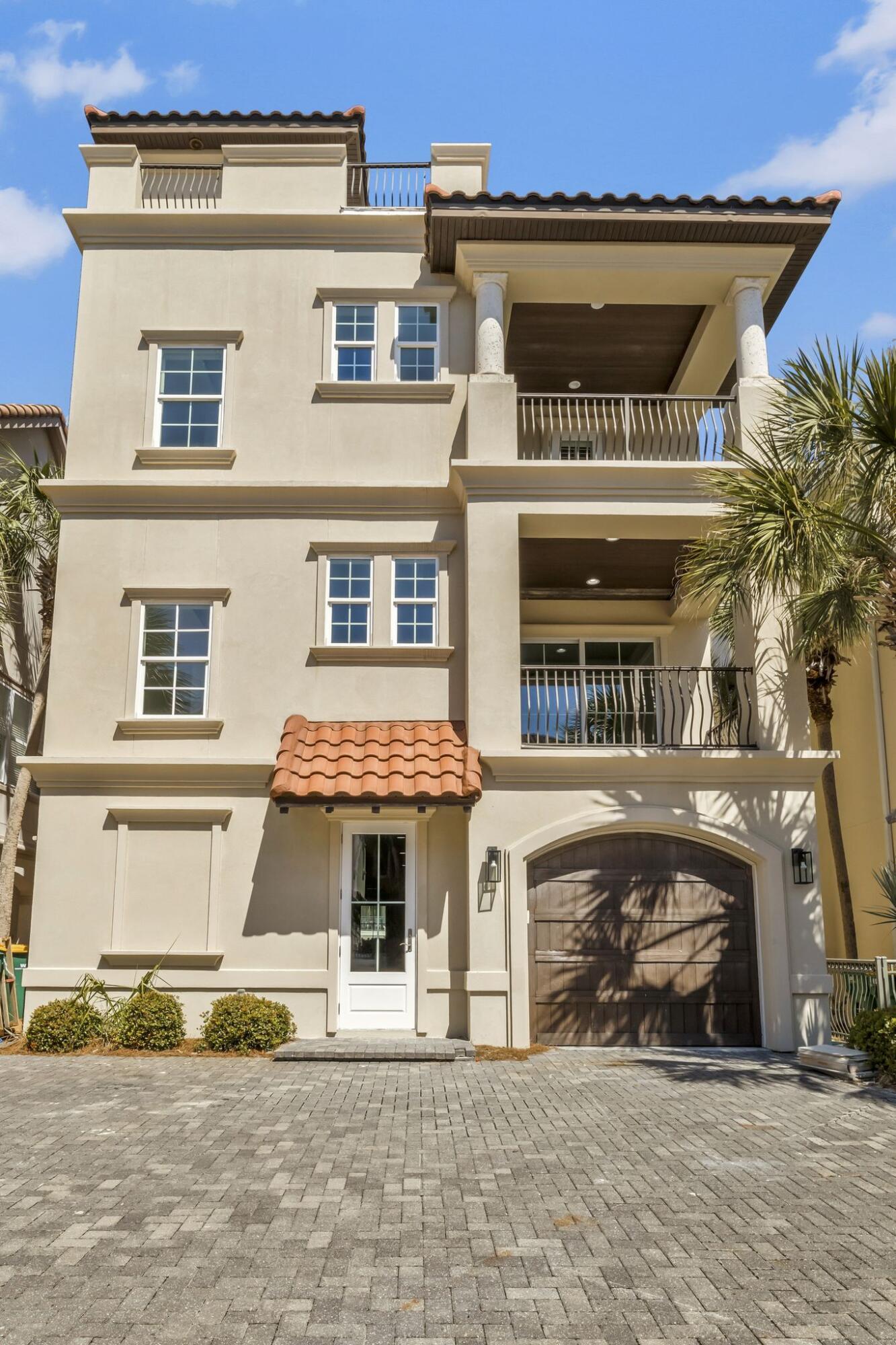 This majestic home located in the prestigious gated beach front community of Destiny by the Sea,  has undergone a complete renovation including  new air conditioners, water heaters, appliances, flooring,  new cabinetry,  plumbing, tile,  lighting fixtures and paint.  The large rooftop deck  showcases spectacular panoramic views.  As you enter the home, the first level features an expansive game room with a refrigerator and wet bar.  The first floor master suite with private sitting area, walk in shower and elegant soaking tub create a spa like atmosphere incud  The second floor features the main living area with a well appointed Chef's Kitchen and large dine in island provides a spacious area for family gatherings.  This home with its impeccable attention to detail is truly an entertainer's dream with spacious balconies on every floor. The second floor boasts an additional master suite and guest rooms. Many of the extraordinary features include an elevator, 2 laundry rooms,  and private garage and storage.   This home is perfect for outdoor living with two decks off  the second floor master, one deck off of main floor master, large deck off living area and spectacular roof top deck.  Destiny by the Sea with its community pool, private deeded beach and 24 hour security make it the most sought after vacation destination on the coast . The proximity to shops, restaurants and entertainment provide the perfect vacation destination. This exquisite home with designer furnishings defines coastal luxury at its finest. 
All information to include verification of square footage and homeowners associations covenants to be verified by Buyer prior to submitting an offer.