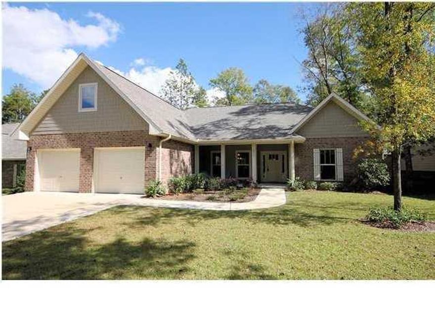 Beauty & function meet perfectly in this gorgeous 5 bedroom, 4 1/2 bath home located in a great neighborhood. Convenient to bases, schools shopping and just a quick 30 minute drive to the most beautiful sugar white beaches around. The community is small and charming and each home is unique with plenty of charm and character. There's a large covered front porch with columns making this perfect for rocking chairs with its southern charm. You will just love this home's open floor plan that is elegant, yet inviting. The Formal Dining Room is to the left when entering, with its beautiful trey ceiling, custom lighting and then opens up to the large family room. The Breakfast area in the kitchen looks out over the back yard & porch and there is a large island and breakfast bar that opens to
