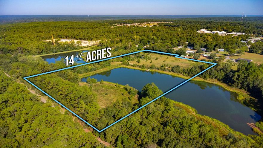 WATERFRONT PROPERTY W/ ACREAGE!! Bring your fishing poles and house plans!! It's time to create your own private oasis while still being practically in town! A rare opportunity to own acreage with such a convenient location. The property is near the new bypass that is under construction on Enzor Rd. Buyer to verify all areas of importance!