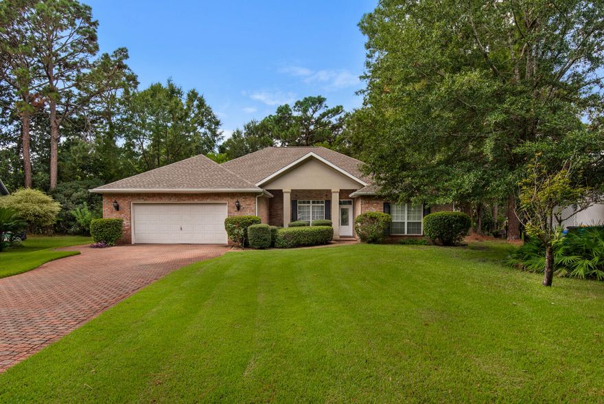 Seller to contribute up to $10,000 toward 2/1 buy down. A 2/1 lowers the interest rate on a mortgage for the first two years before it returns to the original rate. This 4 bedroom home is the perfect blend of comfort and design with it's thoughtful split floor plan and many desirable features, located in sought after Bluewater Bay! The large great room seamlessly connects to the dining and kitchen area, creating an inviting and functional living space for everyday living and entertaining. The kitchen is full of natural light with a breakfast bar, abundant cabinet space, pantry, moveable island and a charming breakfast nook with large bay window to take in the peaceful views of the backyard. The primary suite is huge with sitting area, french doors. Ensuite bathroom with his-and-hers sinks