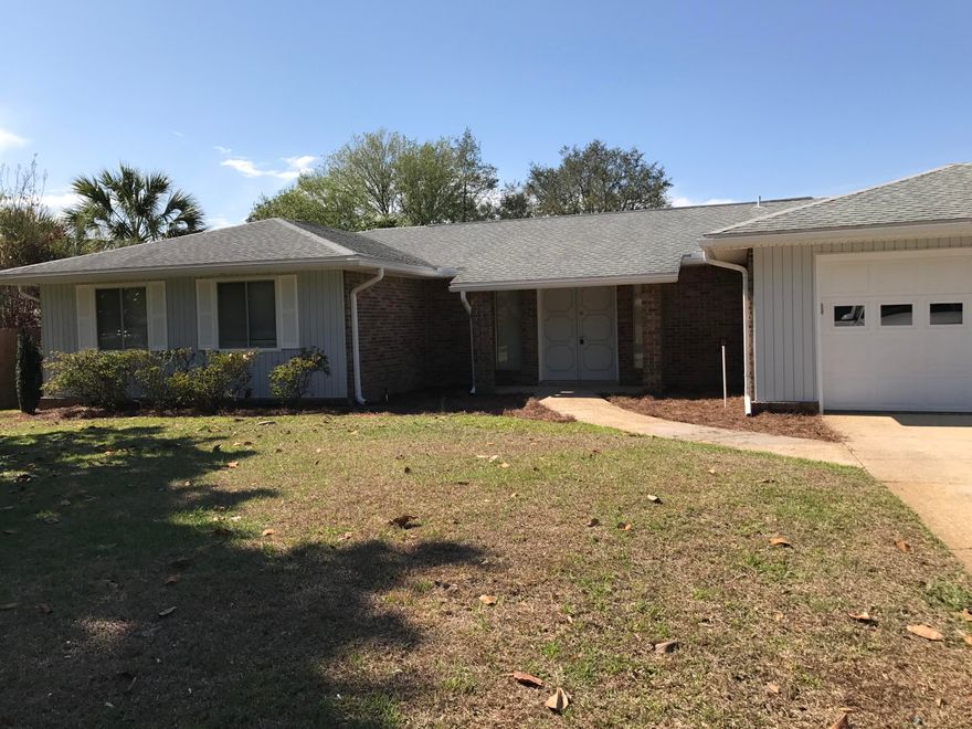 A CHOICE LOCATION IN BLUEWATER BAY! Nice brick home situated on a large lot in the desirable Bluewater Bay neighborhood.  Galley kitchen with new granite counter tops that goes into the eat in Kitchen area. Master bedroom has its own private bath with new granite counter top. Two additional bedrooms and a full bath with new granite counter top completes this home.  Enjoy all the amenities Bluewater Bay has to offer which include tennis, community pools and restaurants. Newly painted, new LVP flooring, and a newer water heater and A/C. Close to schools, shopping, restaurants, Eglin AFB and just minutes to the Mid-bay bridge to Destin with beautiful white sand beaches. Don't miss this one